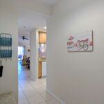 North side of foyer.  Pleasant Leoma Lovegrove paintings and artwork throughout your home.

Looking East.