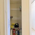Entryway closet near front door.  Currently has various cleaning products in it.

Looking South.
