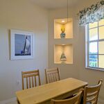 Morning Room/breakfast nook with pleasant art pieces.  A nice place for your cheese and crackers, donuts, fruit, or cereal.  

Looking Northeast.