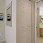 One of the walkin closets next to the primary bedroom.  Bathroom is to the right.

Looking Northeast.
