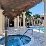 Hot tub located right next to the pool

Looking West.