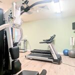 Clubhouse gym that you have access to 24/7/365.  Treadmills abound.

Looking West.